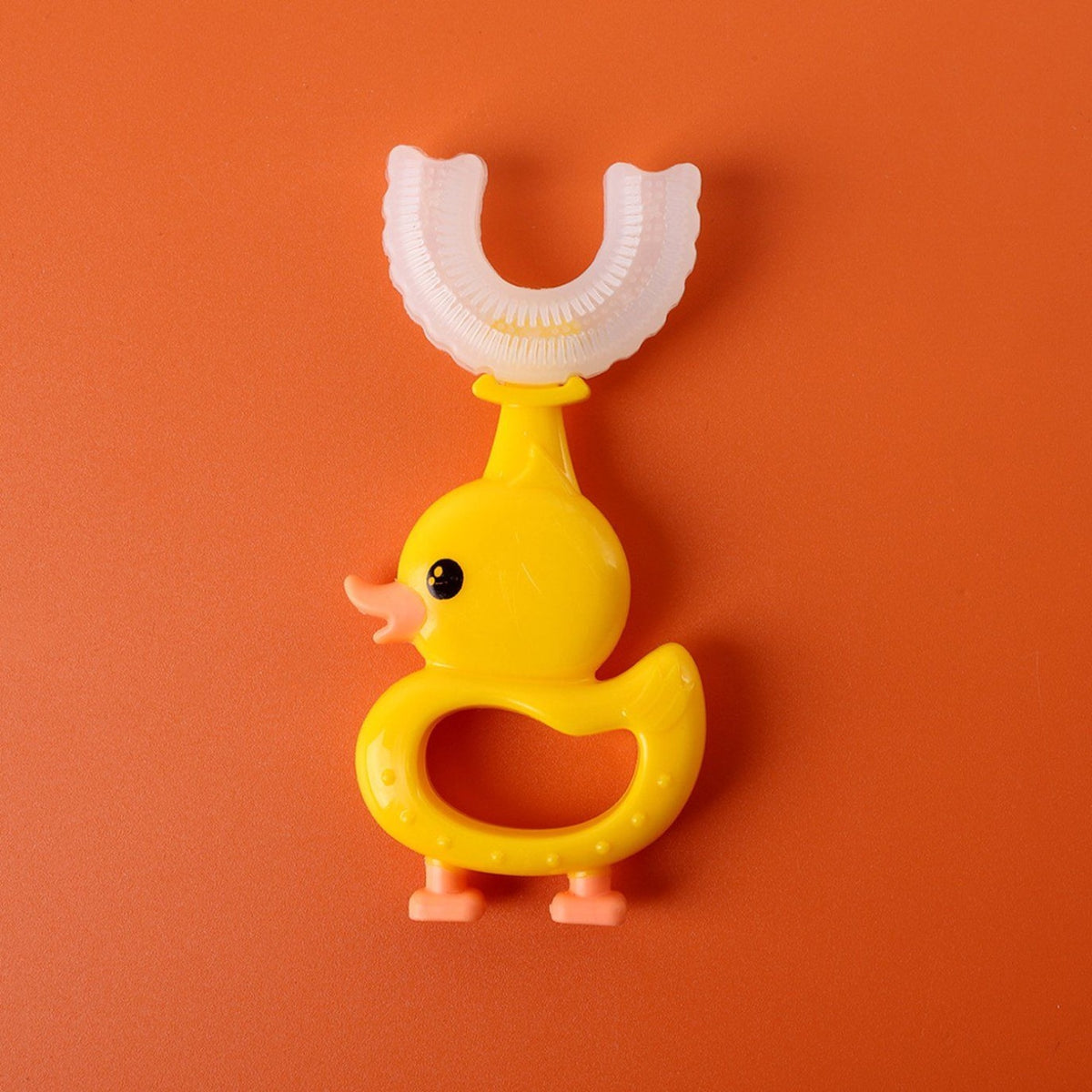 U-Shaped Training Toothbrush (2-pack): Duck U-shaped toothbrush laid flat, showing the easy-grip ring handle